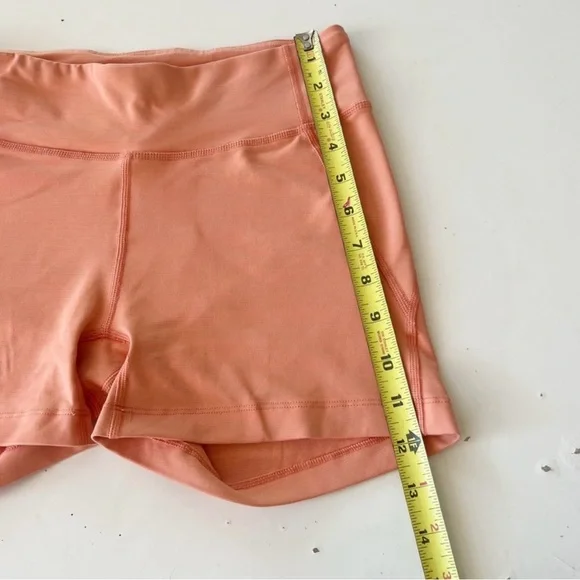 Outdoor Voices Tech Sweat Biker Shorts in Heathered Orange Peach - Picture 12 of 16